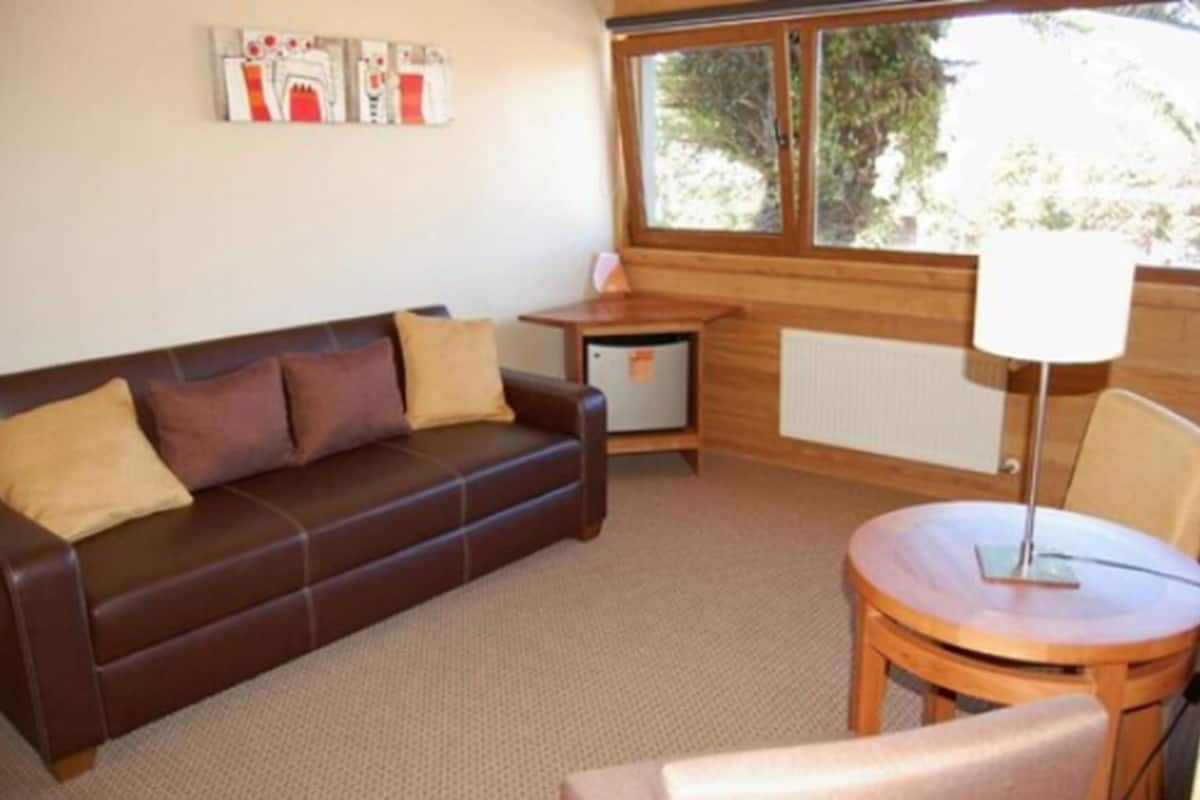 suite | living room | 26-inch flat-screen tv with cable channels, tv