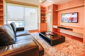 Executive Suite, 2 Bedrooms | Living area | 32-inch flat-screen TV with cable channels, TV - Northgate Ratchayothin (Bangkok)