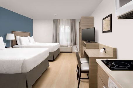 办公桌、笔记本电脑工作区、遮光窗帘、熨斗/熨板. 夏洛特加斯顿龙伍德斯普林套房酒店