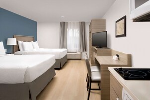 Desk, laptop workspace, blackout drapes, iron/ironing board