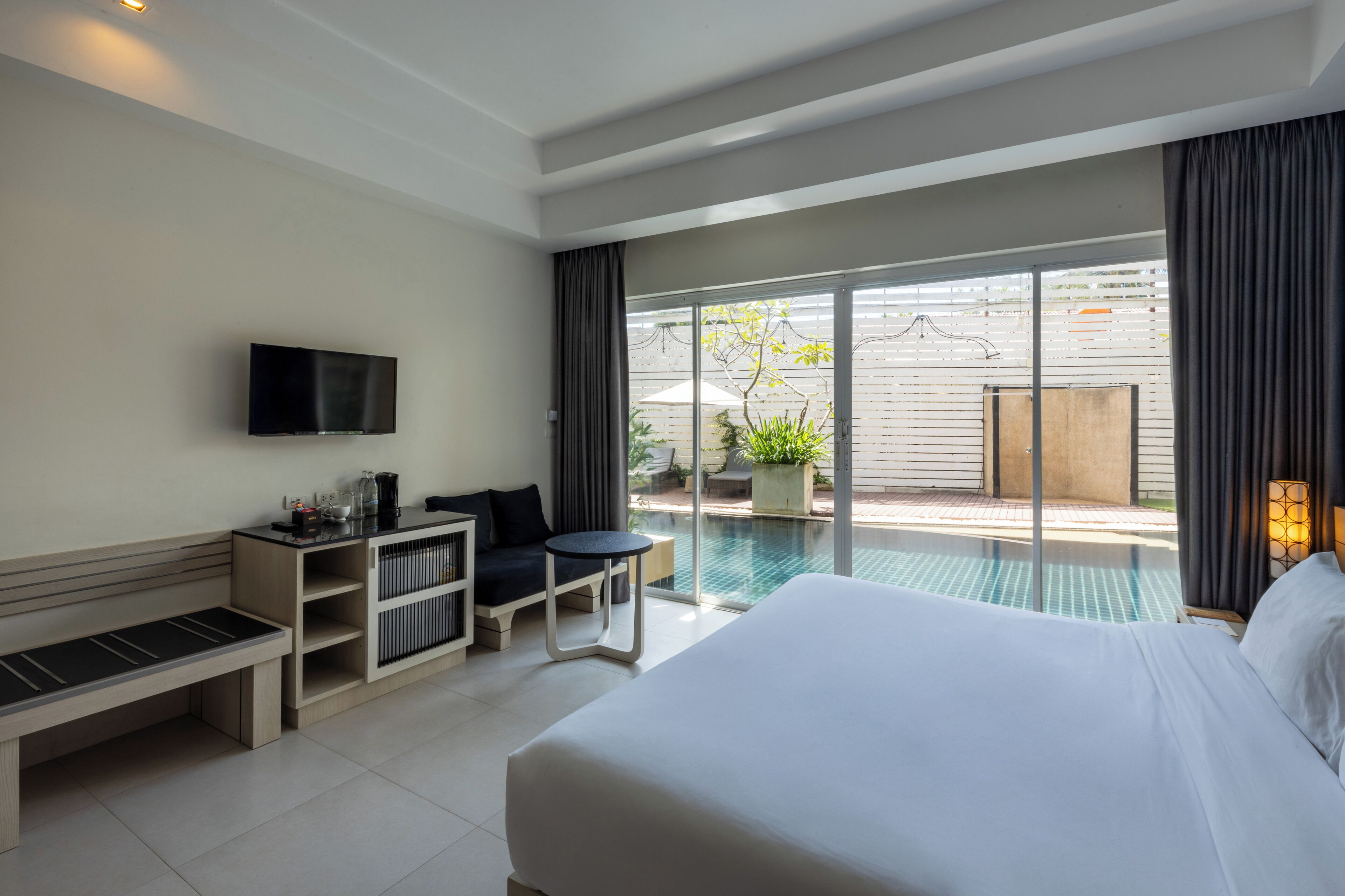 pool access room (double or twin beds) | free minibar items, in-room safe, desk, rollaway beds