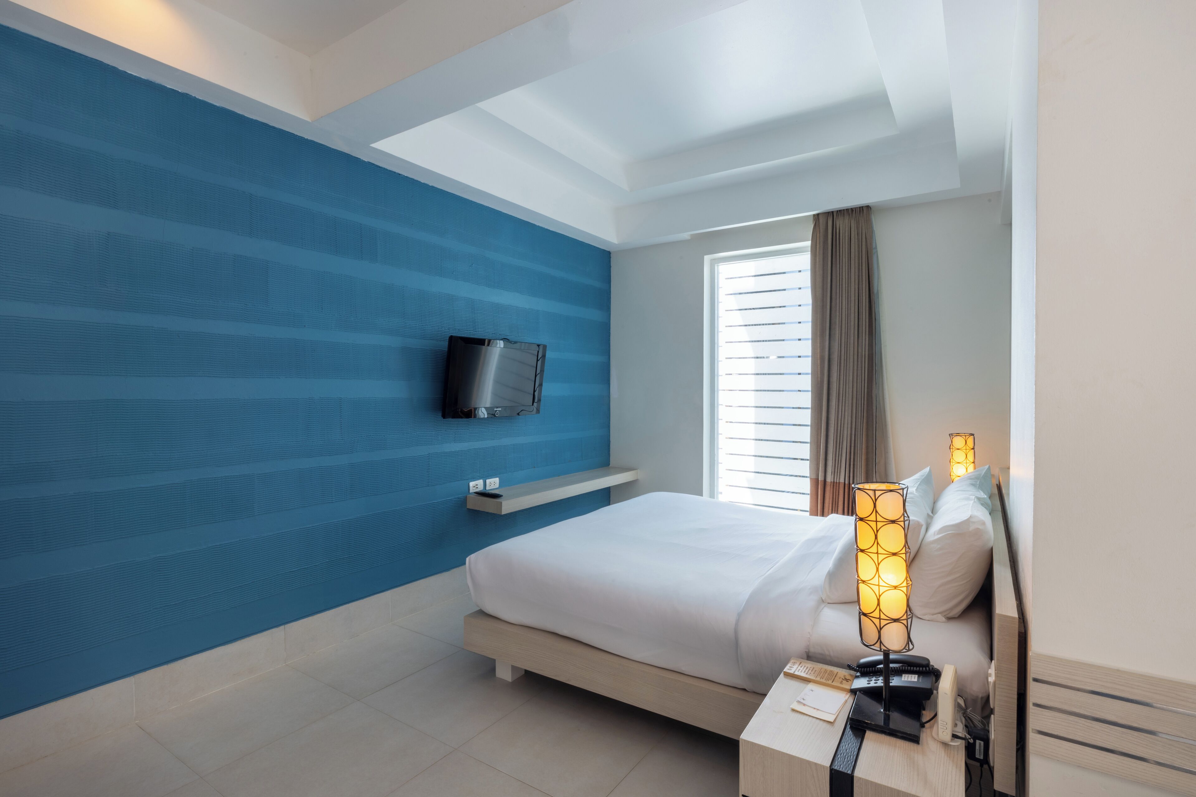 pool access mini suite room | free minibar items, in-room safe, desk, rollaway beds