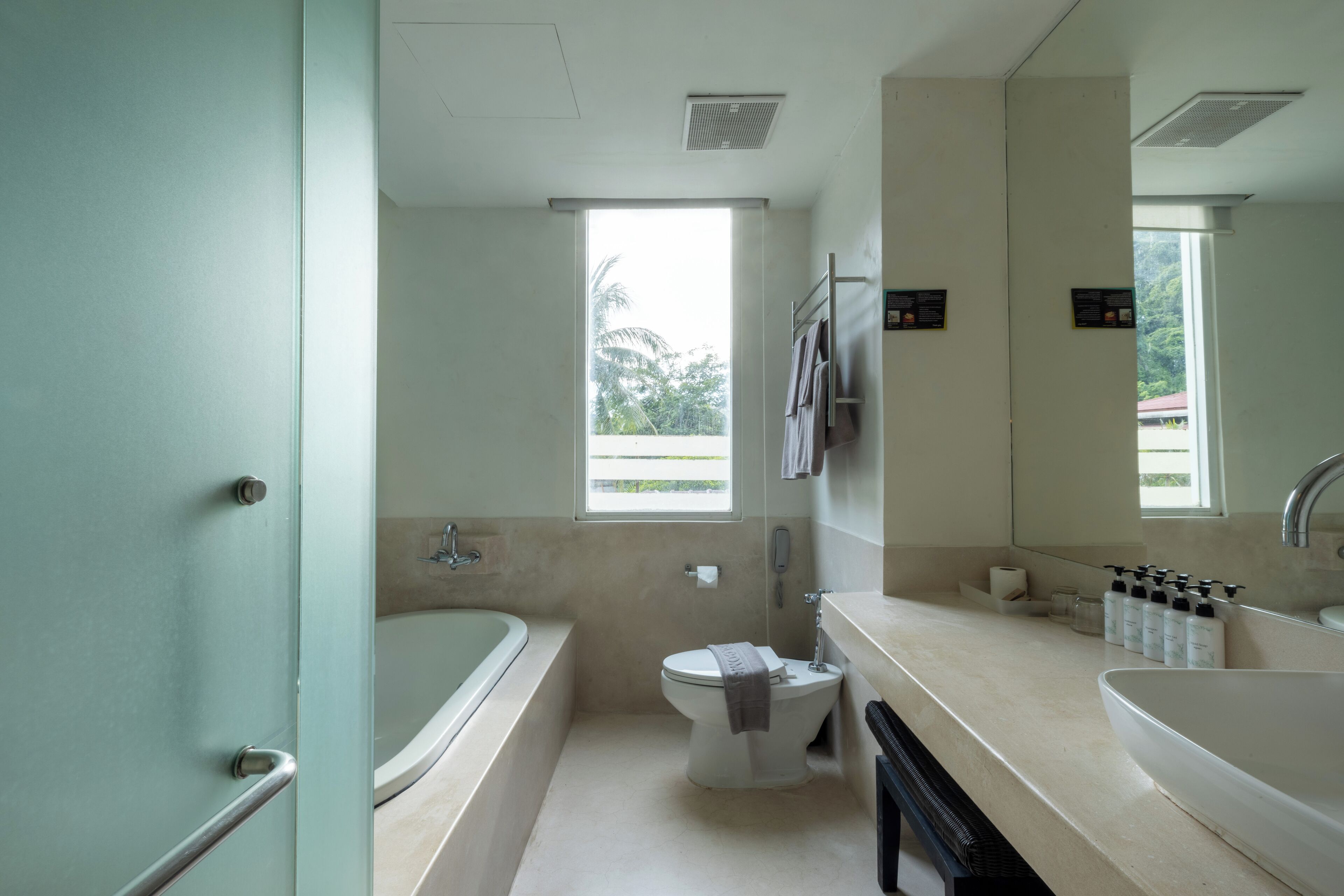 mini suite | bathroom | free toiletries, slippers, towels