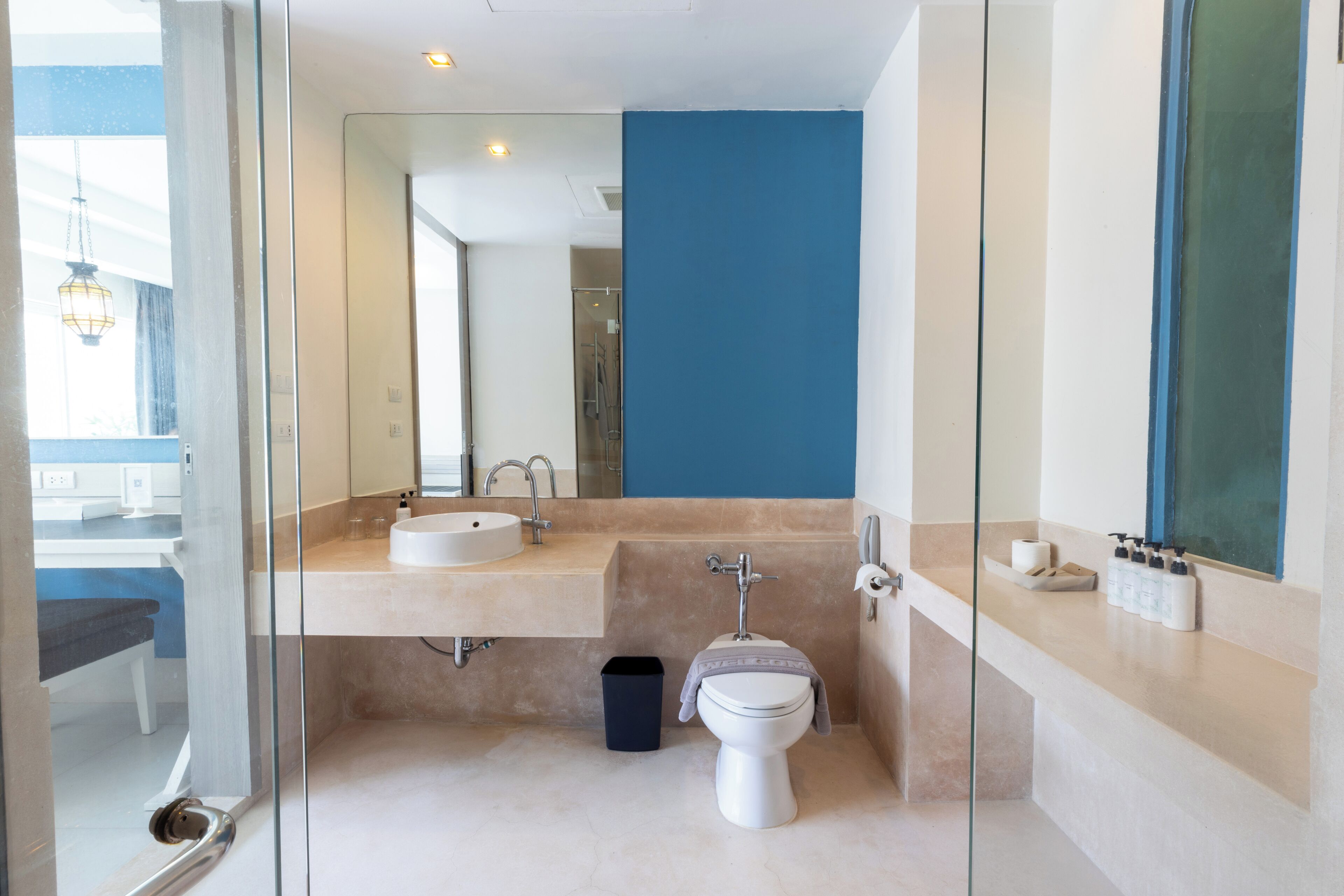 pool access room (double or twin beds) | bathroom | free toiletries, slippers, towels