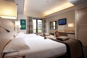 Chambre triple Confort | Literie hypoallergénique, couette en duvet