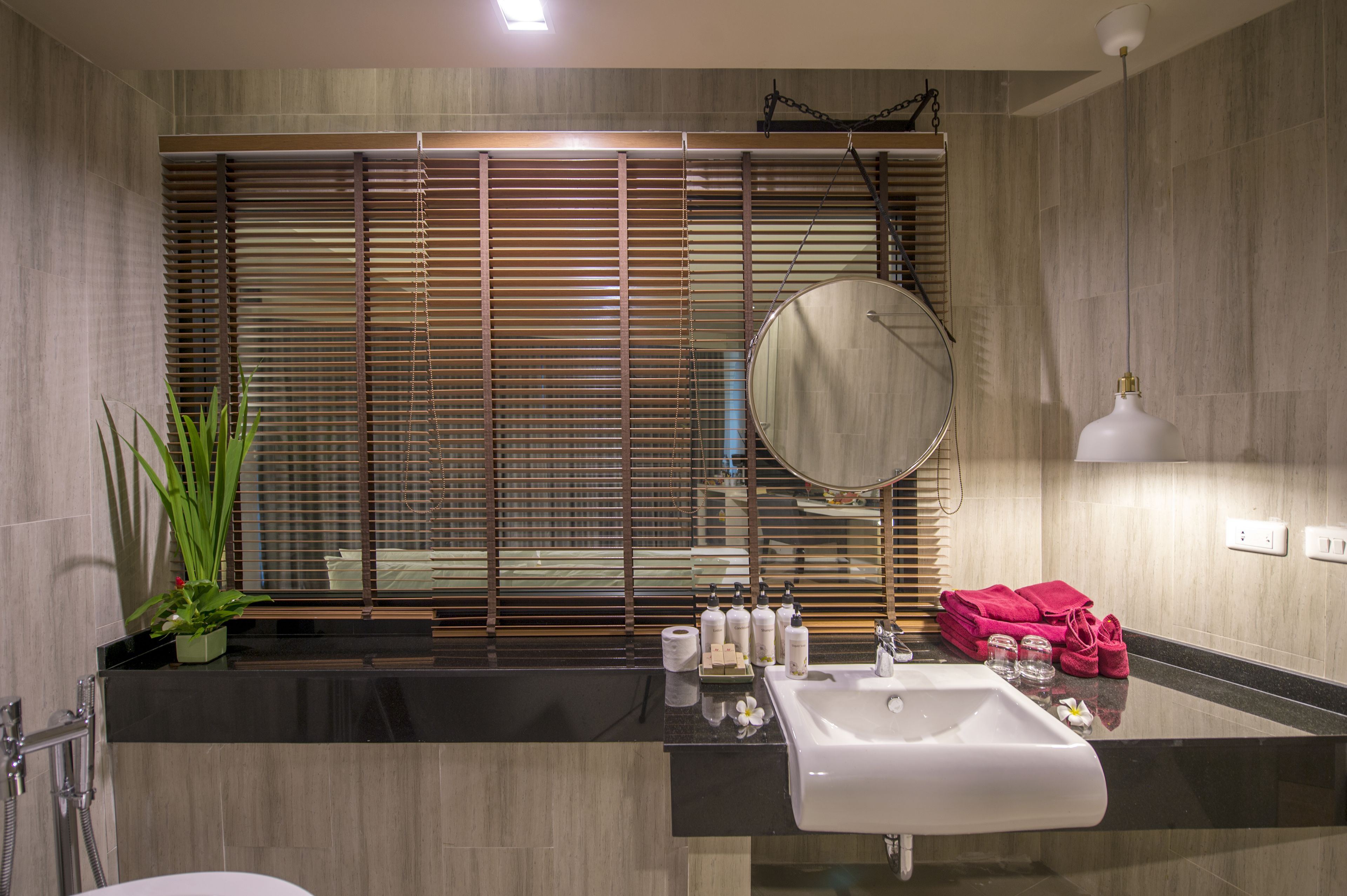 family suite | bathroom | shower, free toiletries, hair dryer, slippers