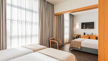 Hypo-allergenic bedding, in-room safe, desk, laptop workspace