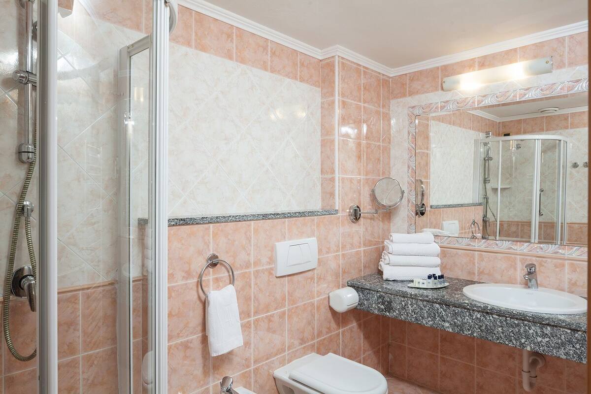 free toiletries, hair dryer, bathrobes, slippers