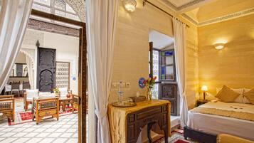 Quarto casal superior | Área de estar