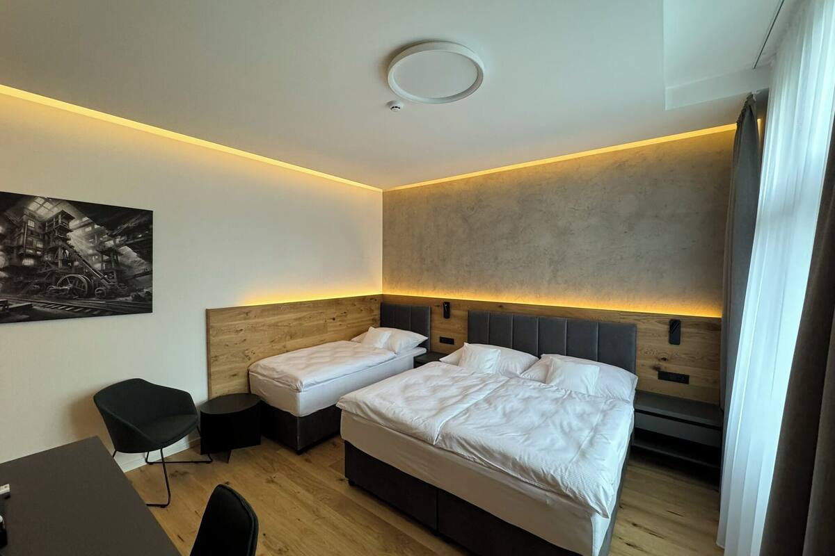 business triple room | 1 bedroom, minibar, in-room safe, desk