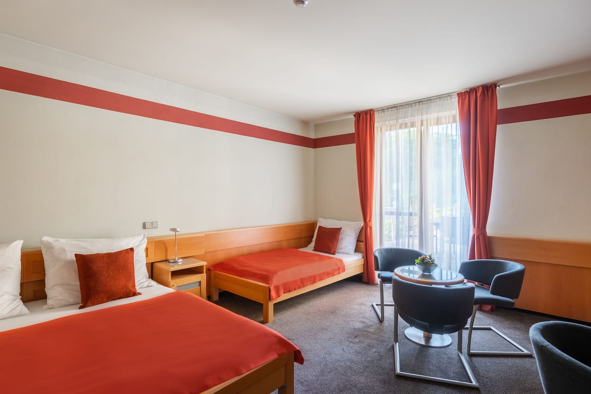 Triple Room | 1 bedroom, minibar, in-room safe, desk
