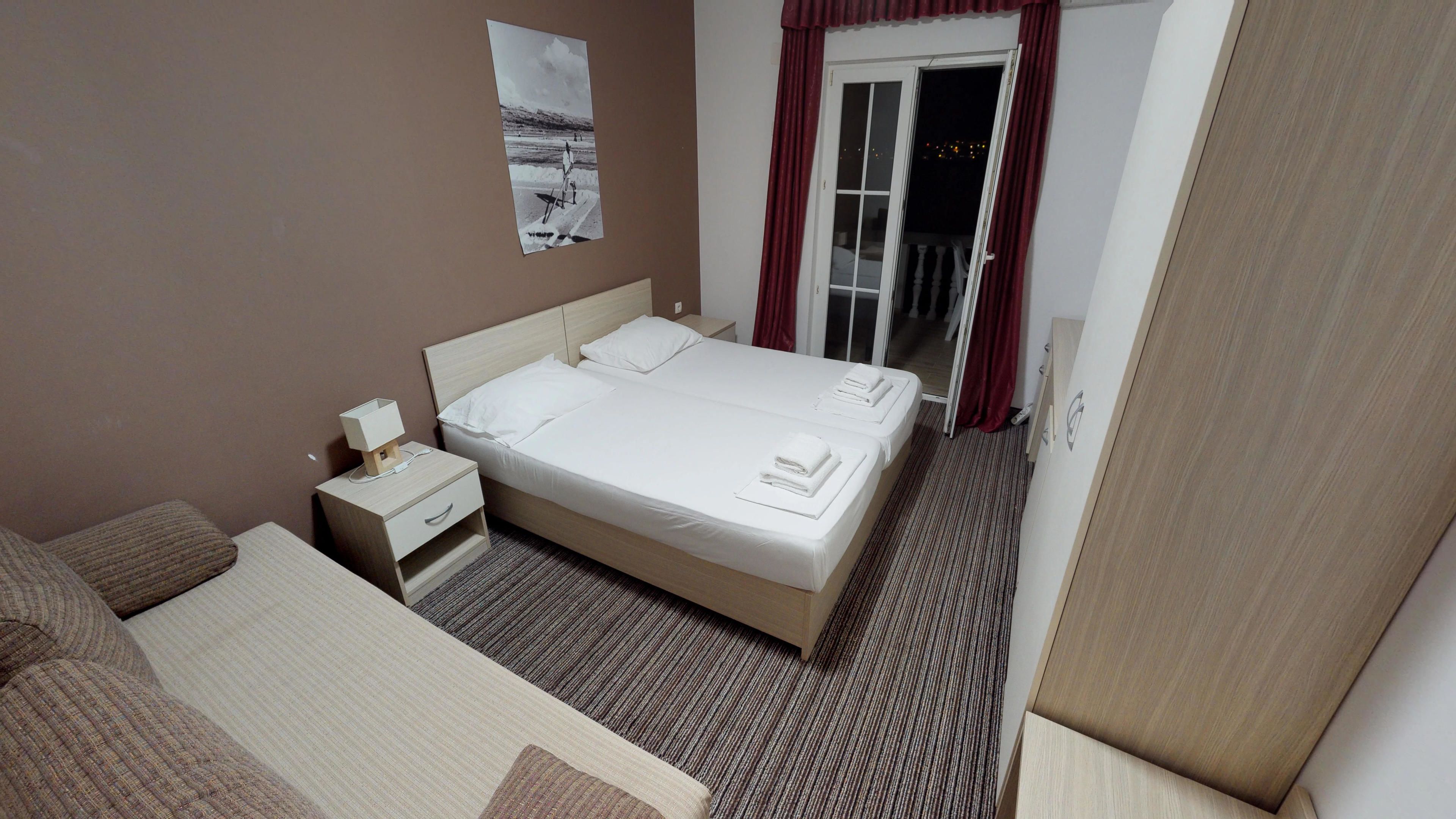 triple room, balcony, sea view | minibar, in-room safe, desk, blackout curtains