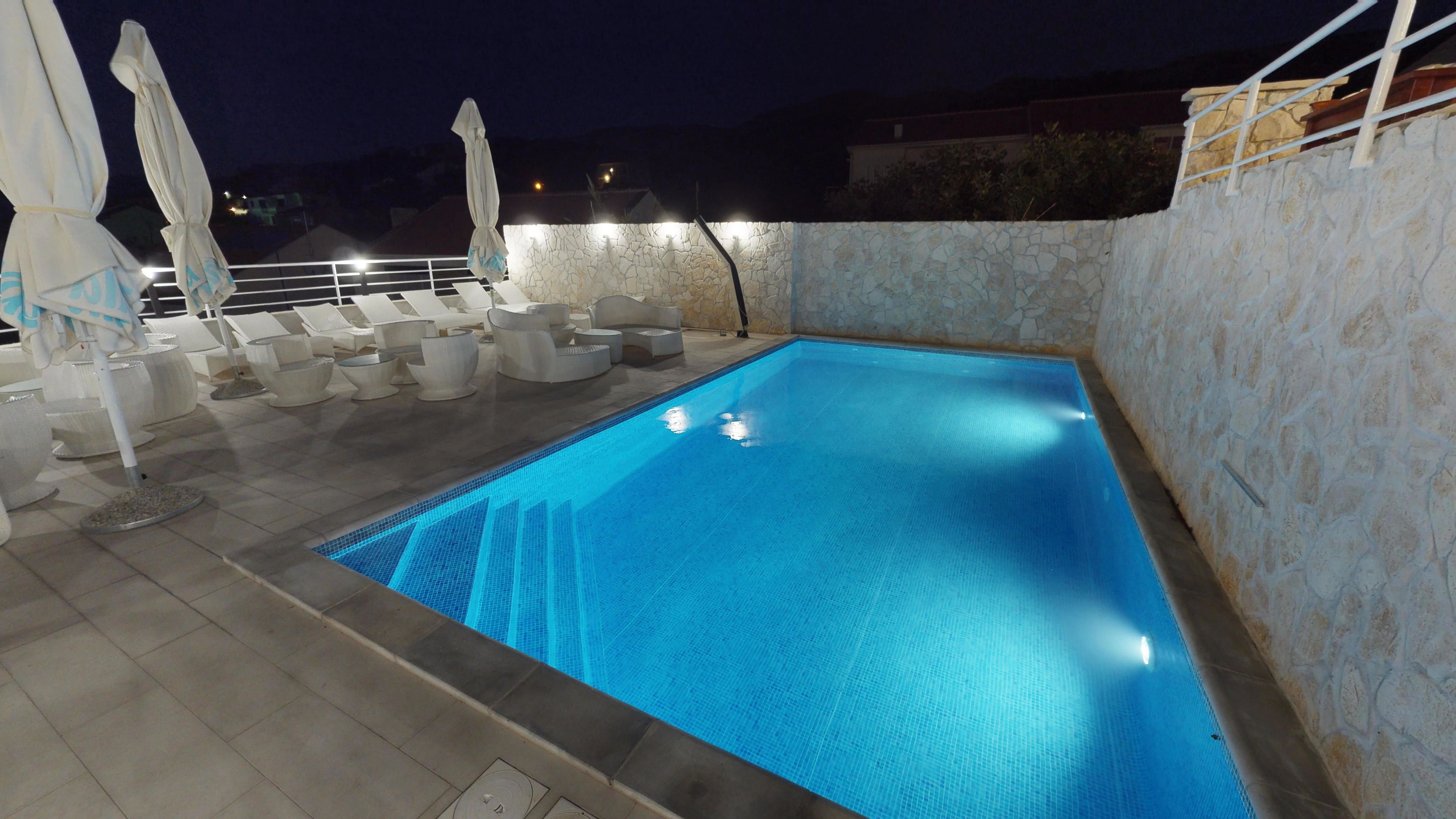 outdoor pool, pool loungers