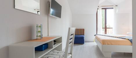 Apartment, Balcony, Partial Ocean View | Desk, iron/ironing board, free cribs/infant beds, free WiFi
