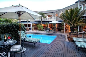 Outdoor pool, pool umbrellas, sun loungers