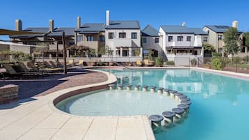 Outdoor pool, open 6 AM to 10 PM, pool umbrellas, sun loungers