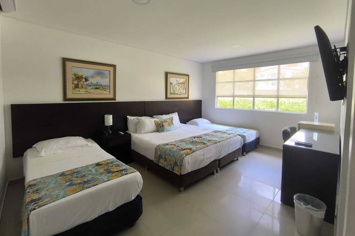Quadruple Room, 1 King Size Bed, 2 Single Beds | 1 bedroom, premium bedding, down duvets, minibar