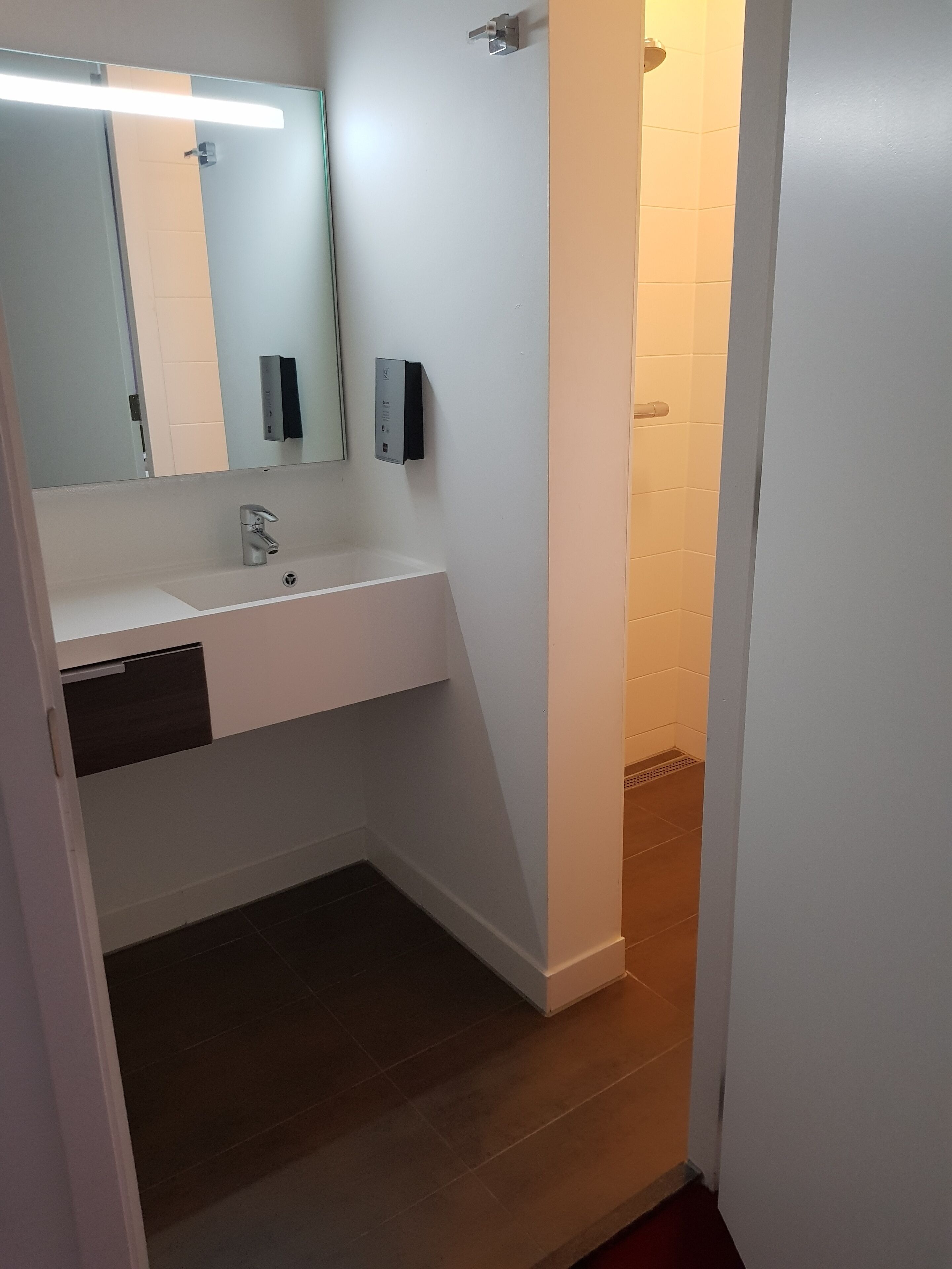 deluxe double room | bathroom | shower, rainfall showerhead, hair dryer, towels