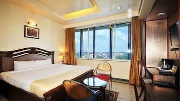 Habitación Deluxe | Ropa de cama de alta calidad, edredón y camas con efecto memoria