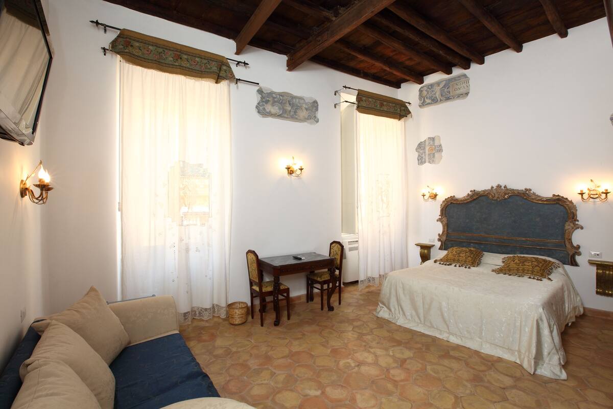 Triple Room | Living area | Flat-screen TV