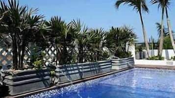 2 outdoor pools, pool umbrellas, pool loungers