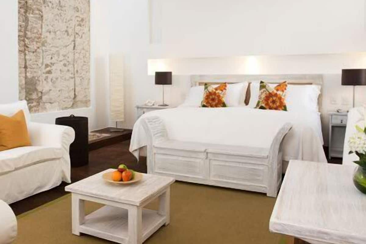 Junior-suite | Egyptiske bomuldslagner, premium-sengetøj, dundyner, minibar