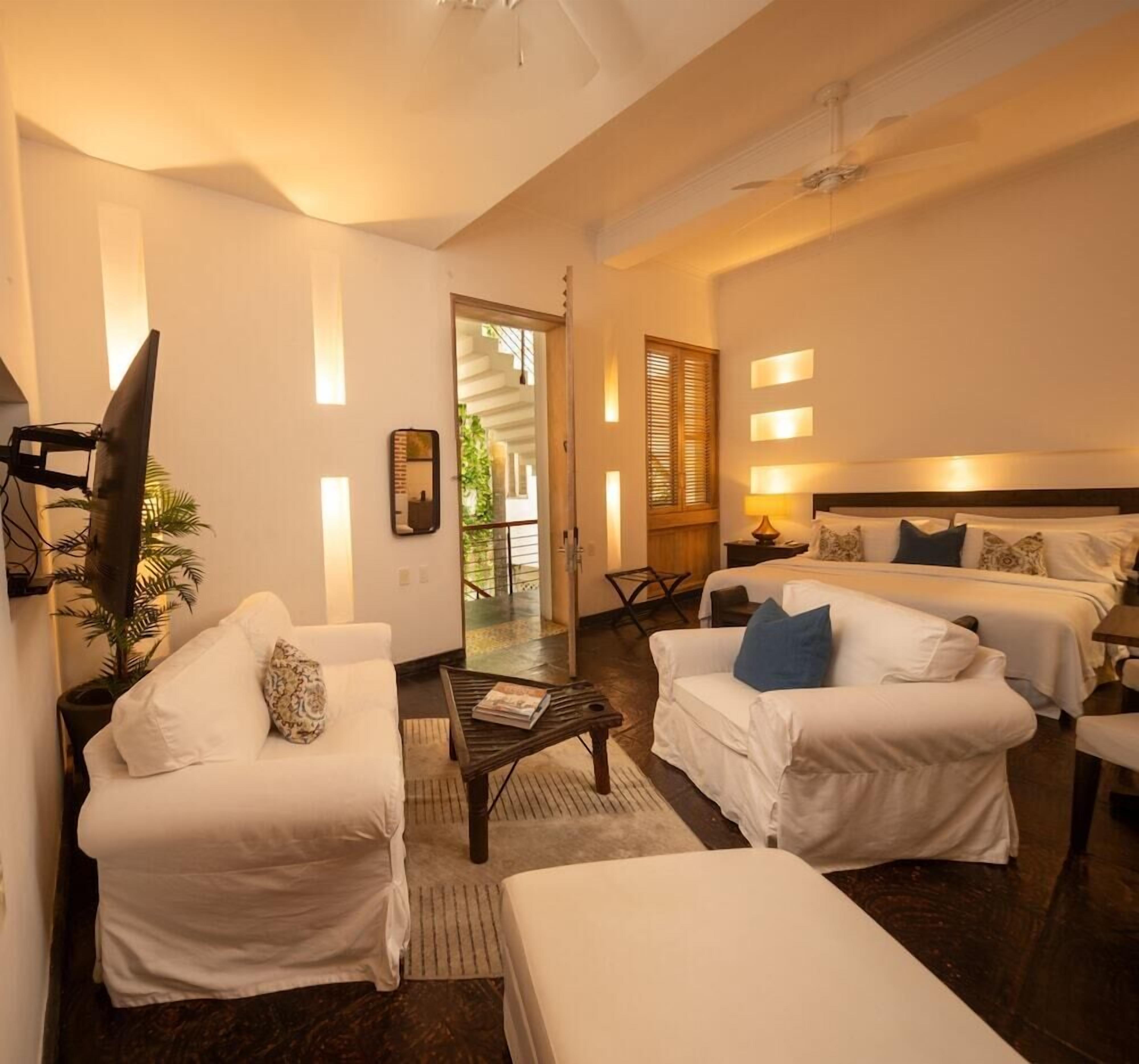 Lakens van Egyptisch katoen, luxe beddengoed, donsdekens, een minibar