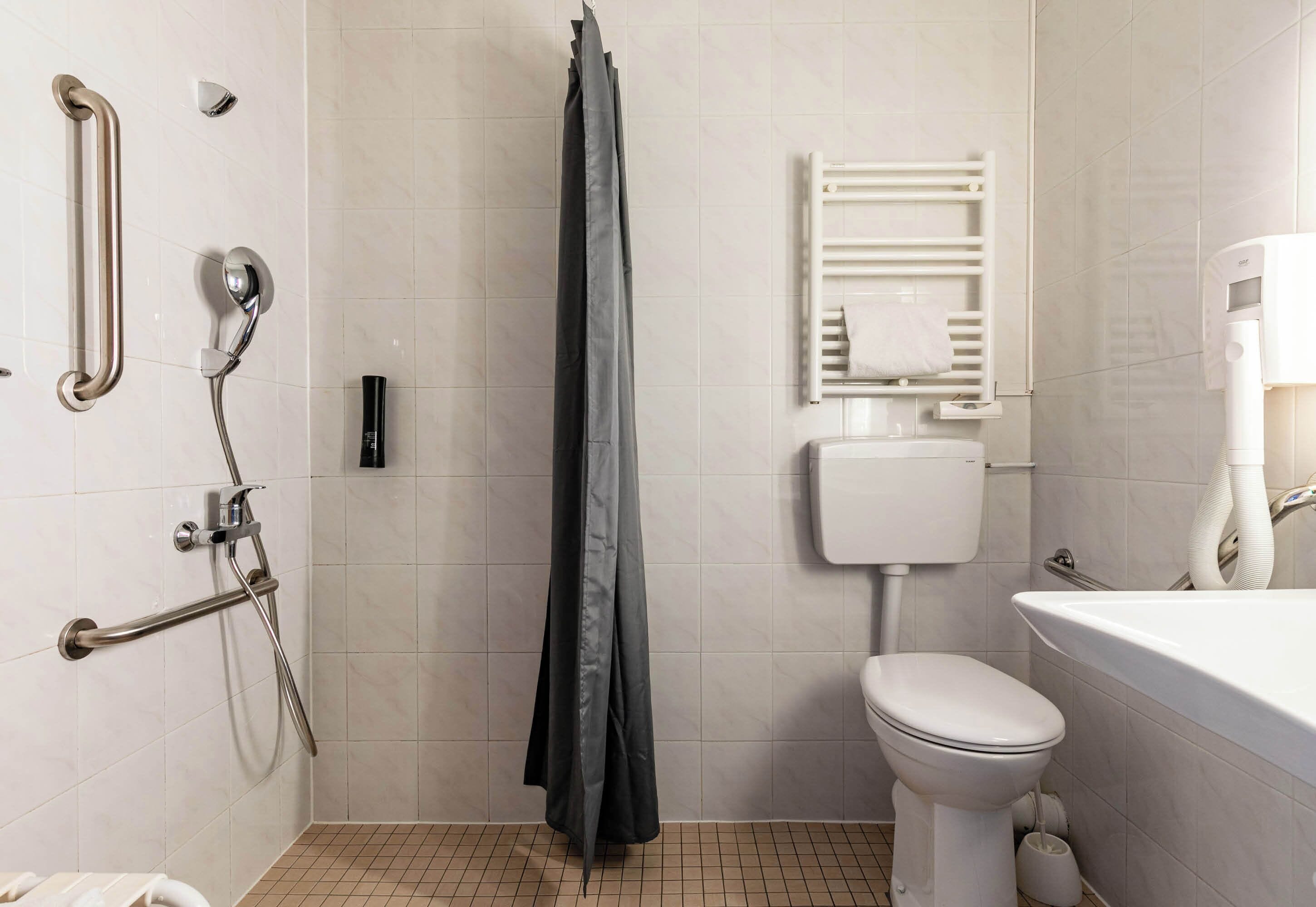 double room, accessible | bathroom | shower, hair dryer, towels, soap