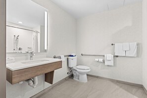 Bathtub, hair dryer, towels