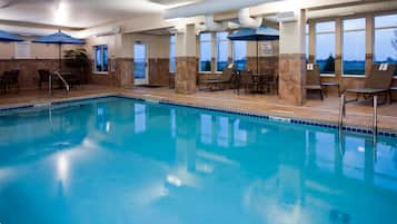 Indoor pool, open 7 AM to 10 PM, sun loungers