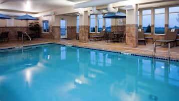 Indoor pool, open 7 AM to 10 PM, sun loungers