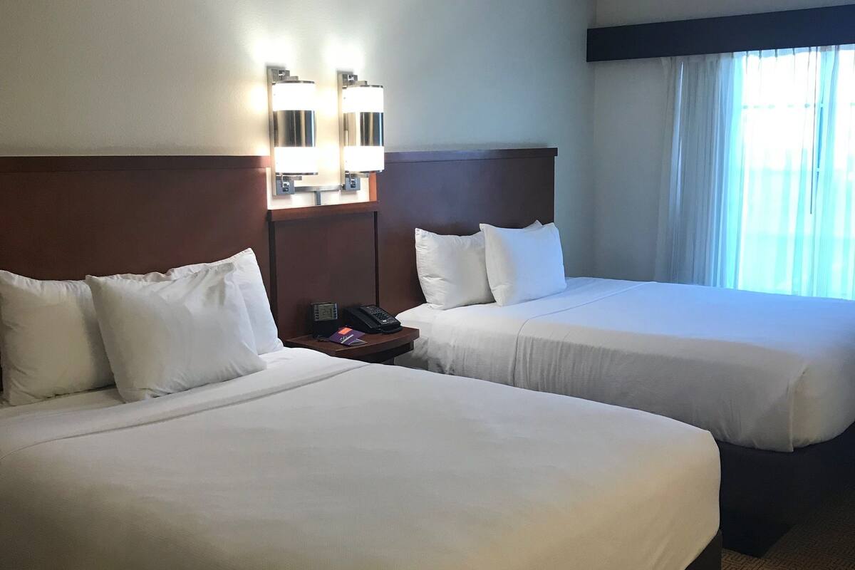 hypo-allergenic bedding, down duvets, desk, laptop workspace