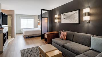 Hypo-allergenic bedding, down duvets, desk, laptop workspace