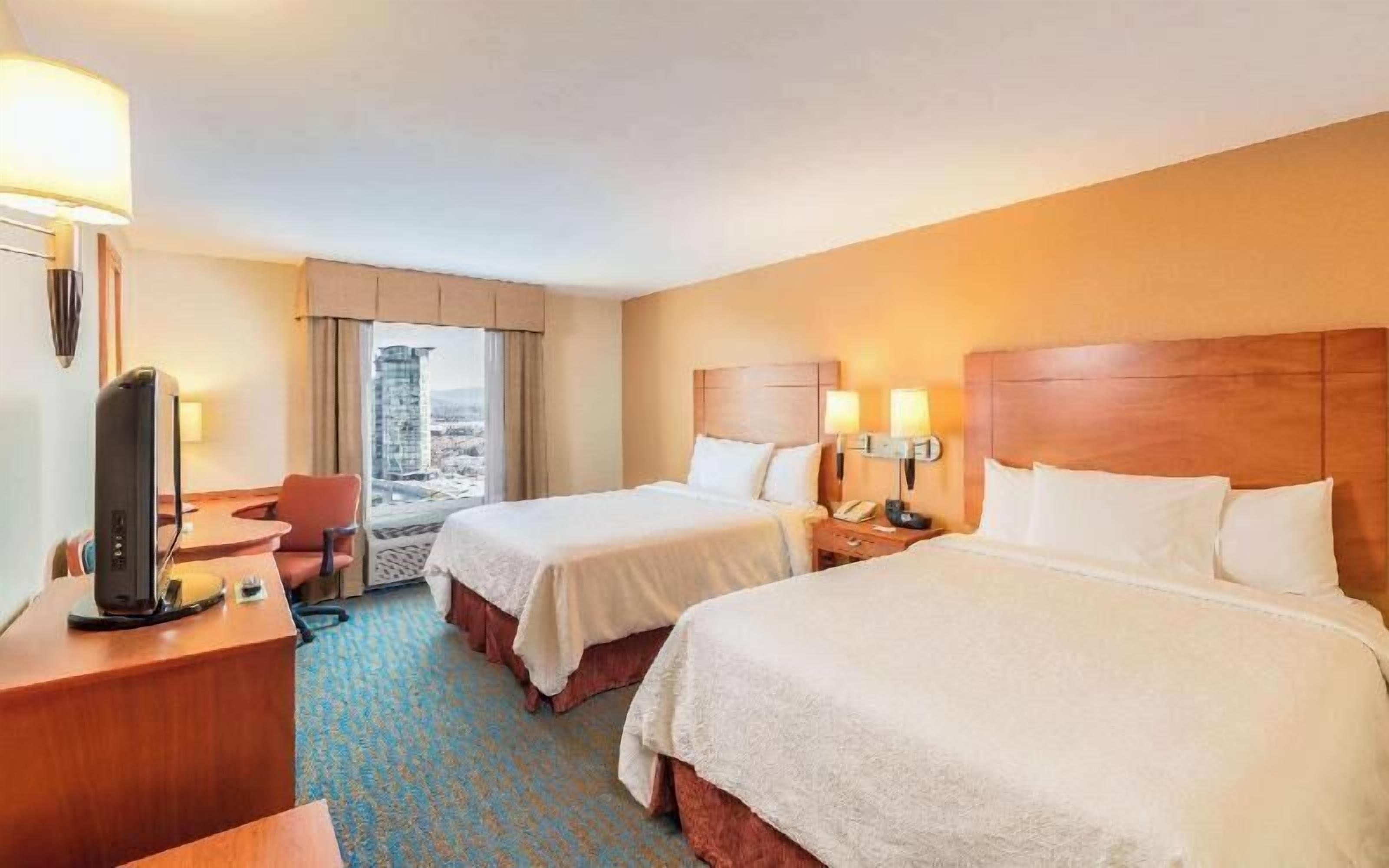 Premium bedding, pillowtop beds, in-room safe, blackout drapes