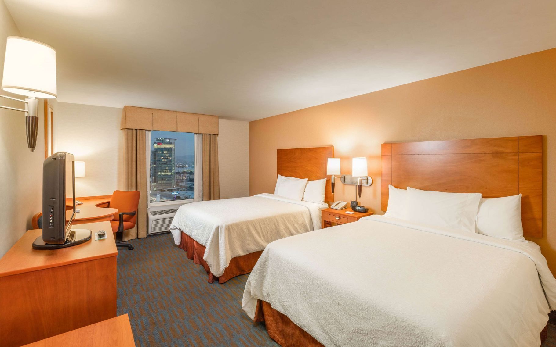 Premium bedding, pillowtop beds, in-room safe, blackout drapes