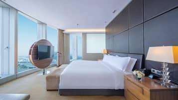 Premium bedding, down duvets, free minibar items, in-room safe