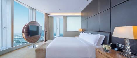 Premium bedding, down comforters, free minibar items, in-room safe