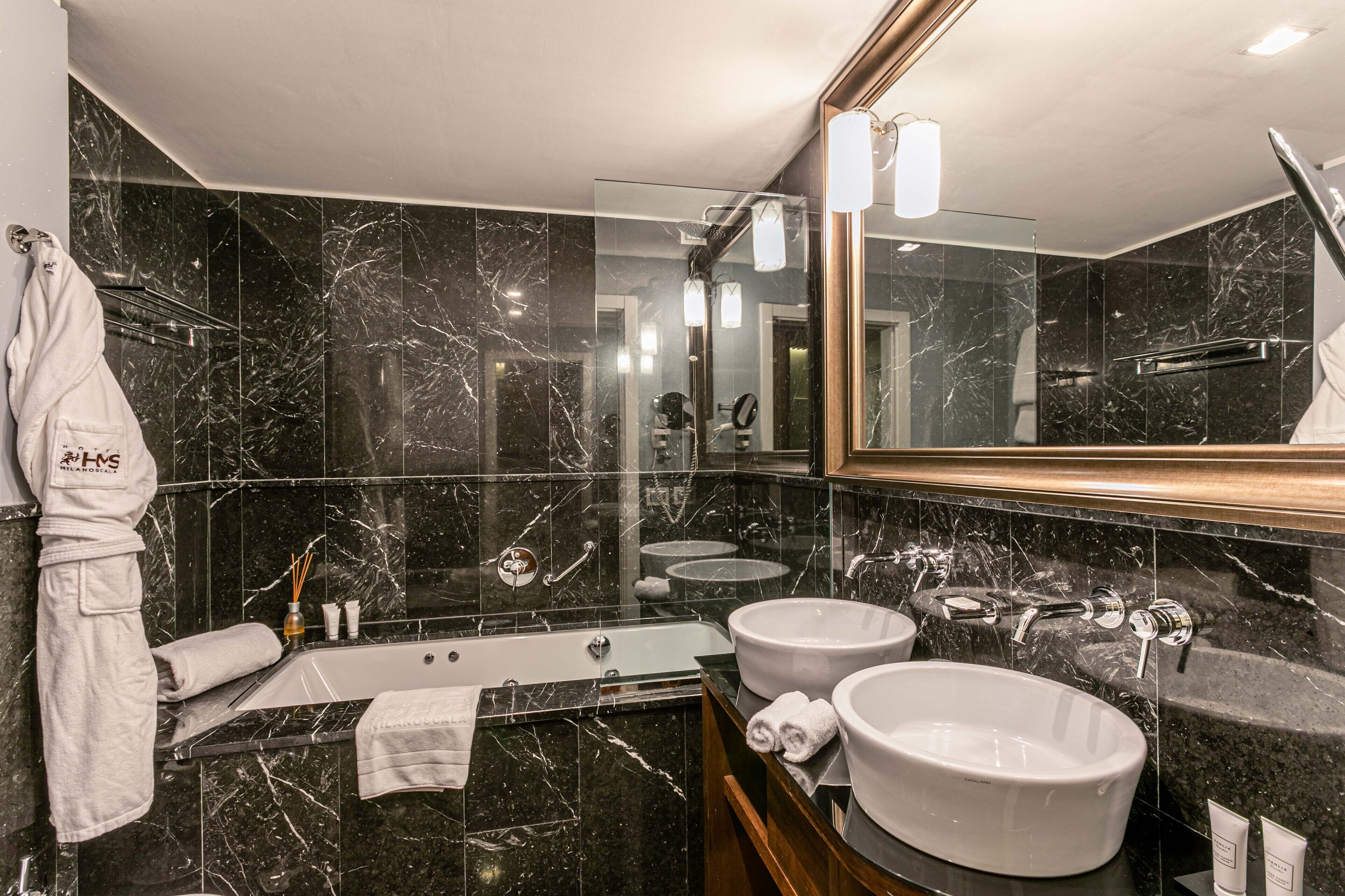 suite (duplex sl) | bathroom | eco-friendly toiletries, hair dryer, bathrobes, slippers