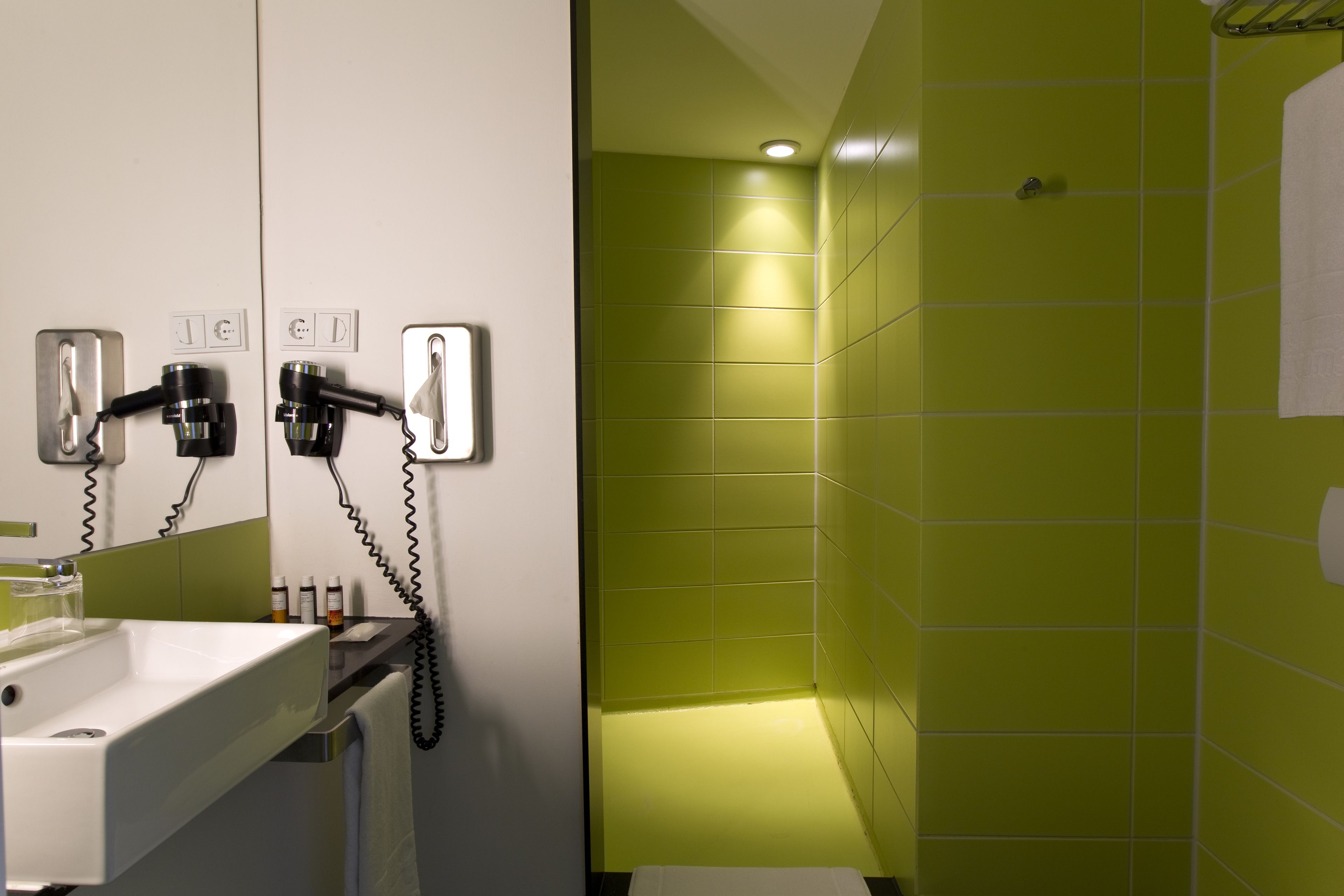 junior studio suite | bathroom | shower, designer toiletries, hair dryer, towels