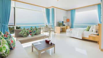 Habitación ejecutiva | Ropa de cama de alta calidad y minibar