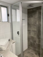 Shower, free toiletries, hair dryer, towels