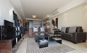 Standard Room, 1 Bedroom | Living area | Flat-screen TV, DVD player
