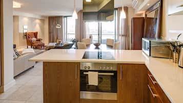 Executive Room, 2 Bedrooms | Private kitchen | Full-sized fridge, microwave, stovetop, cookware/dishes/utensils