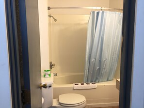 Two queen beds non smoking | Bathroom | Shower, hair dryer, towels, soap - Budget Lodge Inn Abilene (Abilene)