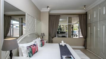 Premium bedding, in-room safe, individually decorated