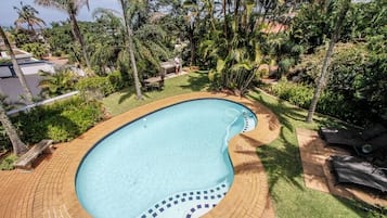 Outdoor pool, pool umbrellas, pool loungers