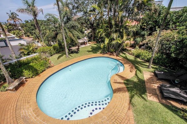 Outdoor pool, pool umbrellas, pool loungers