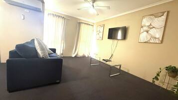 Appartement Familial | Coin séjour | Télévision LCD