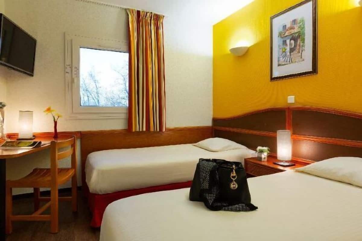 Premium bedding, memory-foam beds, desk, free WiFi