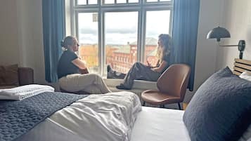 Standard Quadruple Room | Desk, iron/ironing board, free WiFi, bed sheets